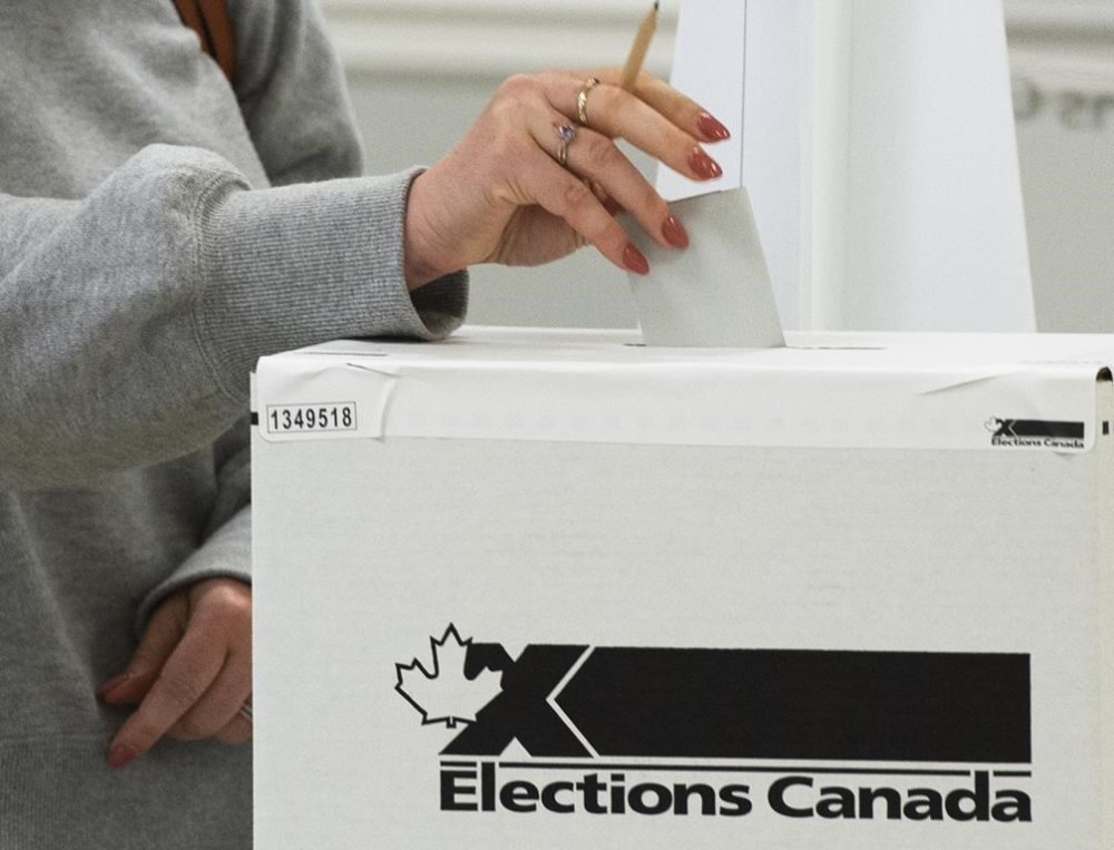 An upcoming byelection in Montreal will have the longest ballot in the history of Canadian federal elections, breaking a record set earlier this summer in Toronto. A voter casts their ballot advance polls for the 2021 federal election, in Chambly, Que., Friday, Sept. 10, 2021. THE CANADIAN PRESS/Ryan Remiorz