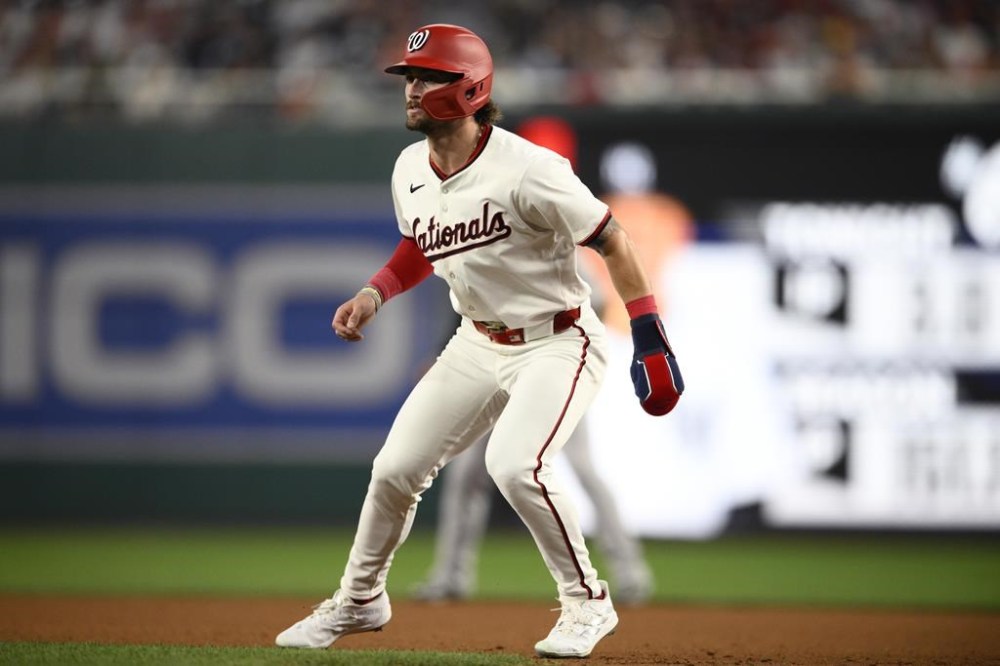 Washington Nationals' Dylan Crews takes a lead from first base during the fourth inning of a baseball game against the New York Yankees, Monday, Aug. 26, 2024, in Washington. (AP Photo/Nick Wass)