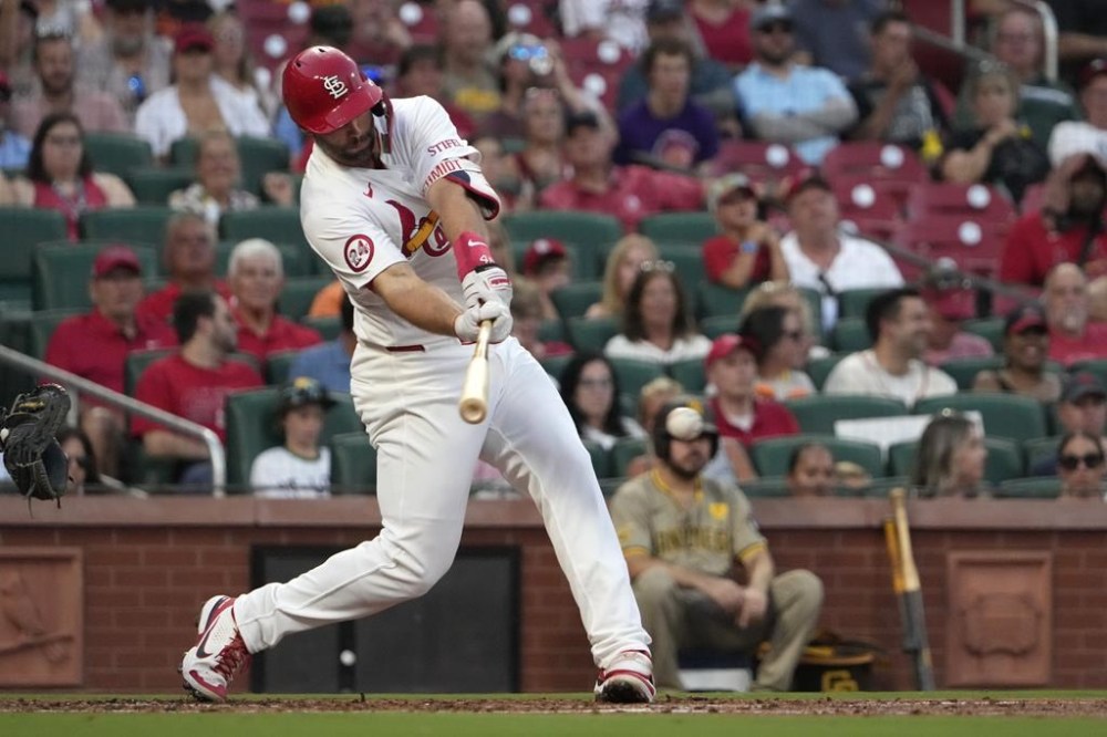 St. Louis Cardinals' Paul Goldschmidt hits an RBI single during the second inning of a baseball game against the San Diego Padres Monday, Aug. 26, 2024, in St. Louis. (AP Photo/Jeff Roberson)