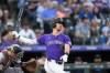 Colorado Rockies' Nolan Jones strikes out against Miami Marlins starting pitcher Edward Cabrera to end the second inning of a baseball game Monday, Aug. 26, 2024, in Denver. (AP Photo/David Zalubowski)
