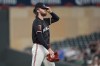 Minnesota Twins starting pitcher Bailey Ober reacts after a three-run home run by Atlanta Braves' Matt Olson during the first inning of a baseball game Monday, Aug. 26, 2024, in Minneapolis. (AP Photo/Abbie Parr)
