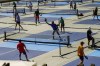 People practice pickleball on the courts of CityPickle at Central Park's Wollman Rink, Saturday, Aug. 24, 2024, in New York. (AP Photo/Eduardo Munoz Alvarez)