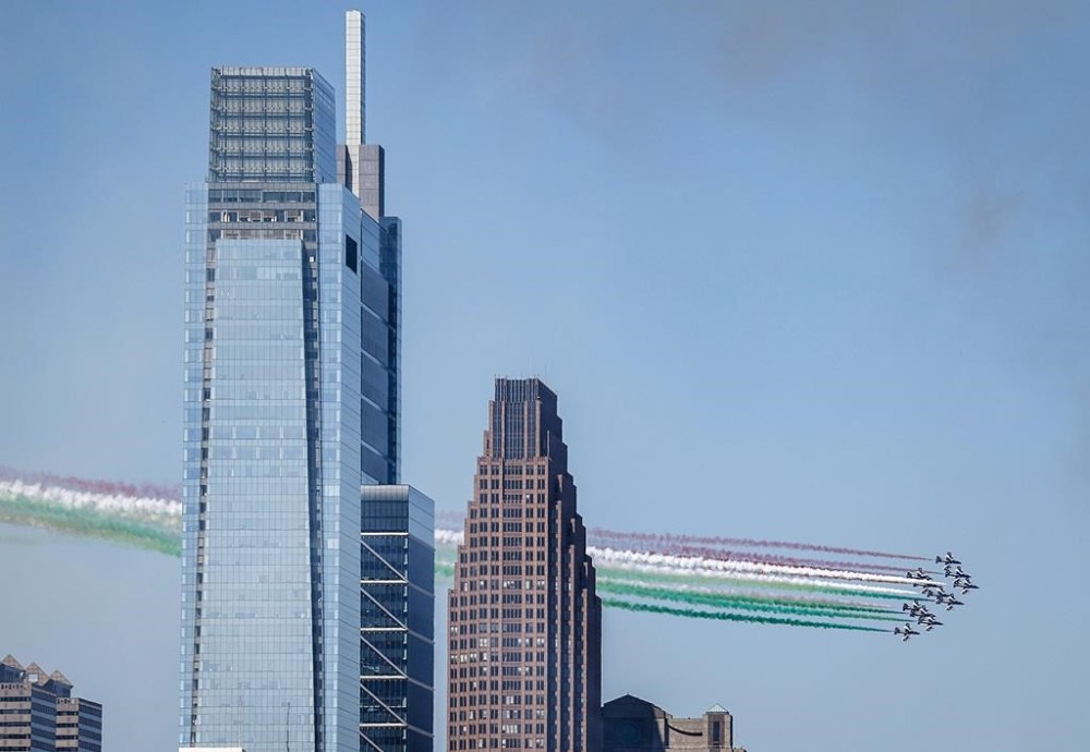 The Italian Air Force Frecce Tricolori flies over Center City Philadelphia on Monday, Aug. 12, 2024. (Yong Kim/The Philadelphia Inquirer via AP)