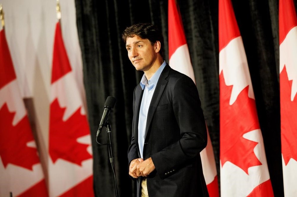 China is slamming Canada's decision to match the United States and impose a 100 per cent import tariff on Chinese electric vehicles. Prime Minister Justin Trudeau speaks to media at the Federal ministers cabinet retreat in Halifax, Monday, Aug. 26, 2024. THE CANADIAN PRESS/Kelly Clark