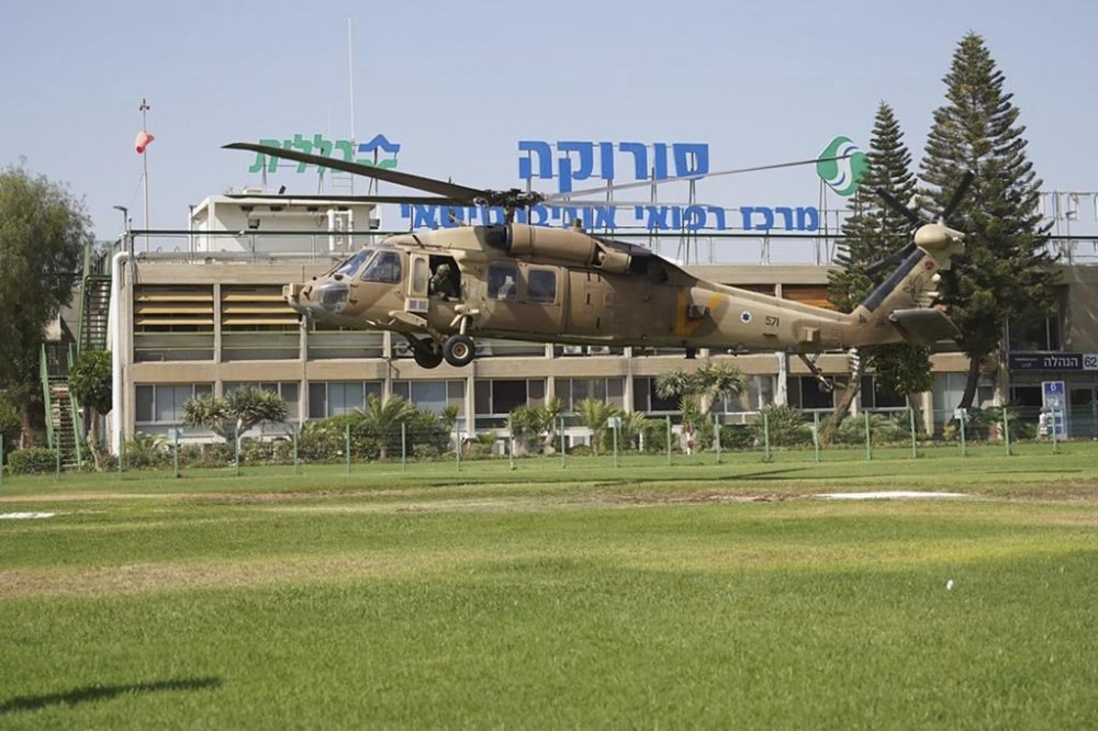 In this photo released by Israeli Defense Forces on Tuesday, Aug. 27, 2024, a military helicopter carrying Qaid Farhan Alkadi lands at the Soroka Medical Center in Beersheba, Israel. The military said on Tuesday that 52-year-old Qaid Farhan Alkadi was rescued