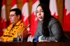 Grand chief of the Algonquin Anishinabeg Tribal Council Savanna McGregor says she is fairly confident a planned assembly for chiefs to vote on a landmark child welfare deal will be postponed until October as a late translation of the document to French presented some chiefs with less time to review its contents. McGregor speaks as Chief Dylan Whiteduck of Kitigan Zibi Anishinabeg First Nation, left, listens, during a news conference in Ottawa, Tuesday, June 20, 2023. THE CANADIAN PRESS/Justin Tang