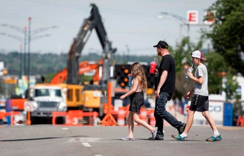 Crews continue to work to repair a major water main break and five other weak spots in Calgary on June 22, 2024. THE CANADIAN PRESS/Jeff McIntosh