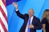 Democratic vice presidential nominee Minnesota Gov. Tim Walz, waves to the crowd after speaking during the Democratic National Convention Wednesday, Aug. 21, 2024, in Chicago. (AP Photo/J. Scott Applewhite)