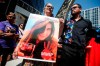 Krystal Fox and Jeremy Contois, brother of Rebecca Contois, express their joy as other families and supporters of four murdered women celebrate outside the Manitoba Law Courts after guilty verdicts of serial killer Jeremy Skibicki are read in a courtroom in Winnipeg on July 11, 2024. THE CANADIAN PRESS/John Woods