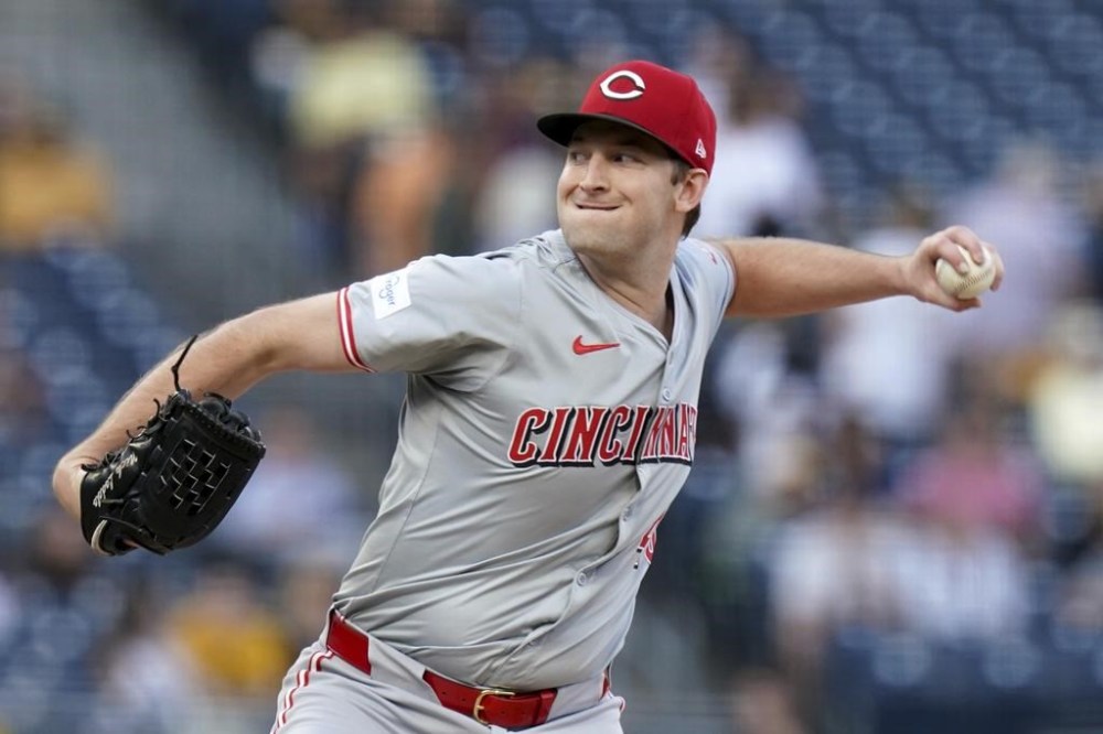 Cincinnati Reds starting pitcher Nick Lodolo delivers during the first inning of a baseball game against the Pittsburgh Pirates Thursday, Aug. 22, 2024, in Pittsburgh. (AP Photo/Matt Freed)