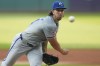 Kansas City Royals' Michael Lorenzen pitches in the first inning of a baseball game against the Cleveland Guardians Tuesday, Aug. 27, 2024, in Cleveland. (AP Photo/Sue Ogrocki)