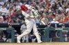 Philadelphia Phillies' Nick Castellanos hits a three run homer in the third inning of a baseball game against the Houston Astros, Tuesday, Aug. 27, 2024, in Philadelphia. (AP Photo/Laurence Kesterson)