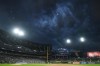 Dark clouds roll in over Guaranteed Rate field as it starts to rain during the first inning of a baseball game between the Texas Rangers and Chicago White Sox, Tuesday, Aug. 27, 2024, in Chicago. (AP Photo/Erin Hooley)