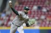 Oakland Athletics relief pitcher Michel Otanez throws against the Cincinnati Reds during the sixth inning of a baseball game, Tuesday, Aug. 27, 2024, in Cincinnati. (AP Photo/Jay LaPrete)