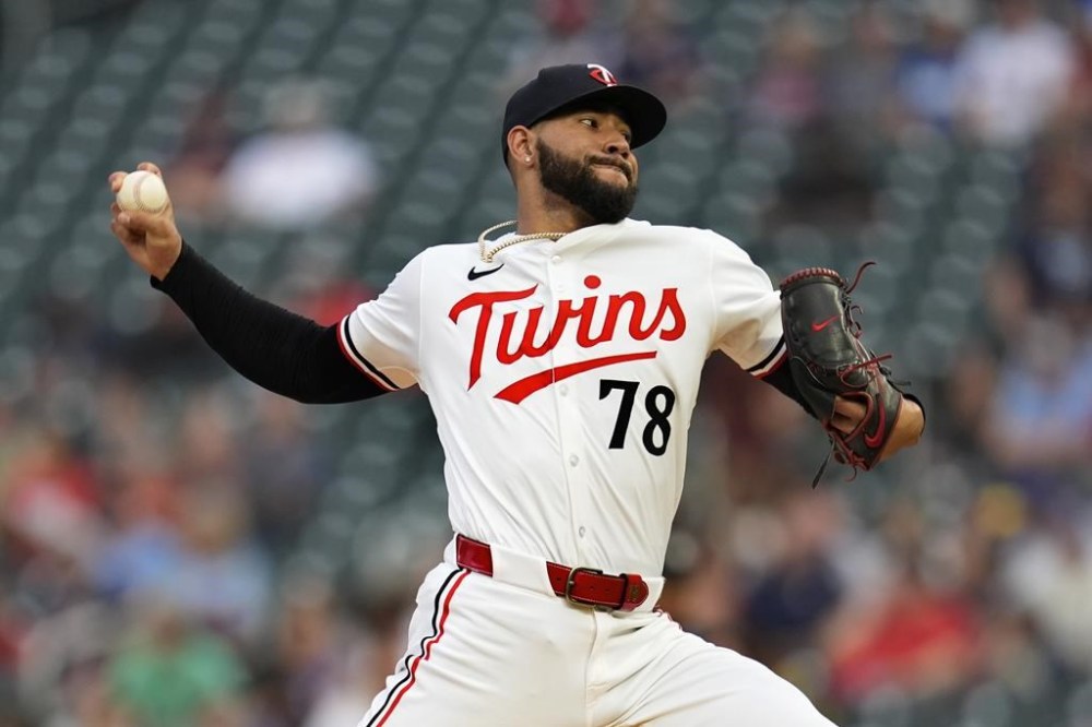 Minnesota Twins starting pitcher Simeon Woods Richardson (78) delivers during the first inning of a baseball game against the Atlanta Braves, Tuesday, Aug. 27, 2024, in Minneapolis. (AP Photo/Abbie Parr)