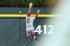 Los Angeles Angels center fielder Kevin Pillar is unable to catch the solo home run hit by Detroit Tigers' Riley Greene during the sixth inning of a baseball game, Tuesday, Aug. 27, 2024, in Detroit. (AP Photo/Carlos Osorio)