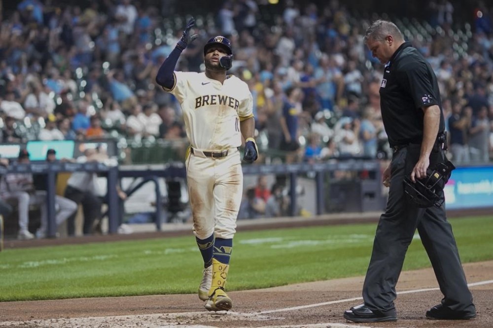 Milwaukee Brewers' Jackson Chourio reacts after hitting a two-run home run during the third inning of a baseball game against the San Francisco Giants Tuesday, Aug. 27, 2024, in Milwaukee. (AP Photo/Morry Gash)