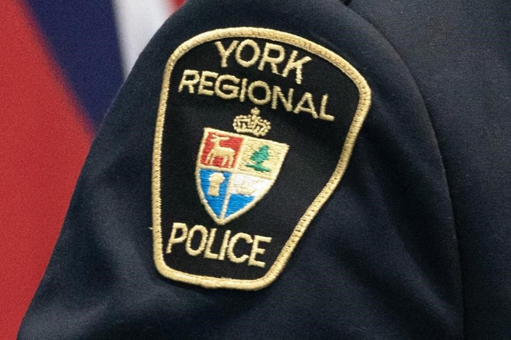 York Regional Police have issued a Canada-wide arrant for a suspect wanted for murder in connection with the disappearance and death of a Toronto-area realtor whose remains were found two weeks ago. A York Regional Police patch is shown Dec, 19, 2022. THE CANADIAN PRESS/Arlyn McAdorey