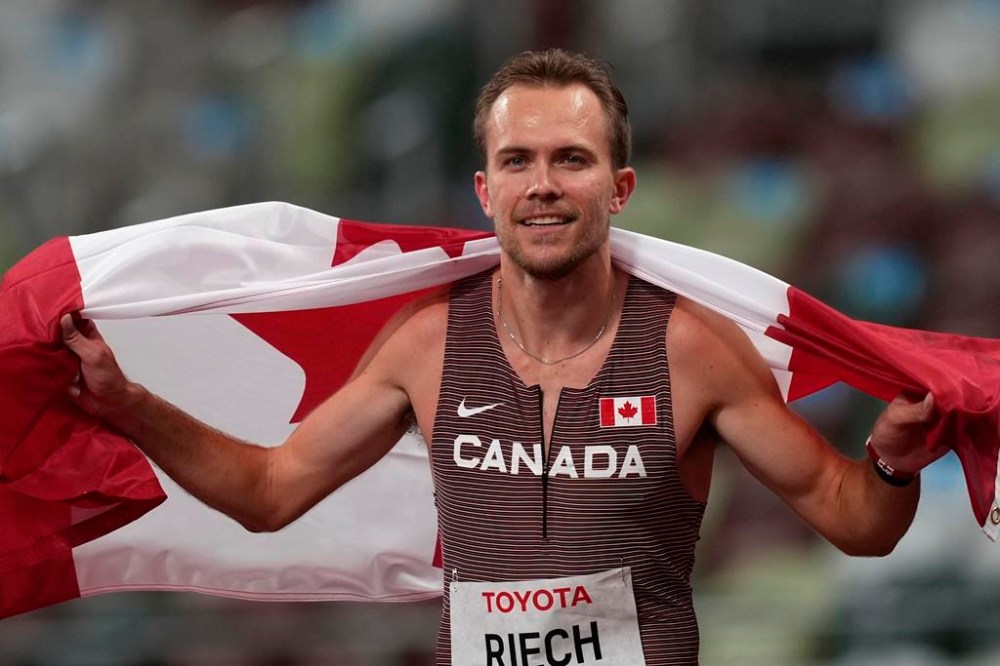 Canada's Nate Riech celebrates after winning the men's T38 1500-meters final at Tokyo 2020 Paralympic Games, Sept. 4, 2021, in Tokyo, Japan. Nate Riech, track and field
Reigning Paralympic and world champion and world-record holder in the men's 1,500 T38 (co-ordination impairment), the 28-year-old from Victoria has been unbeatable in major events since 2018. (AP Photo/Emilio Morenatti)