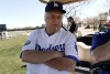 FILE - Los Angeles Dodgers Tommy Lasorda watches practice during spring training baseball in Phoenix, Sunday, Feb. 17, 2013. (AP Photo/Paul Sancya, File)