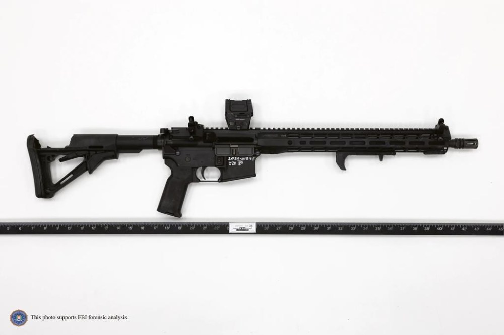 This image provided by the FBI shows Thomas Matthew Crooks' rifle as recovered at the scene in Butler, Pa., July 13, 2024. Crooks searched online for events of both former President Donald Trump and President Joe Biden and saw the Pennsylvania campaign rally where he opened fire as a