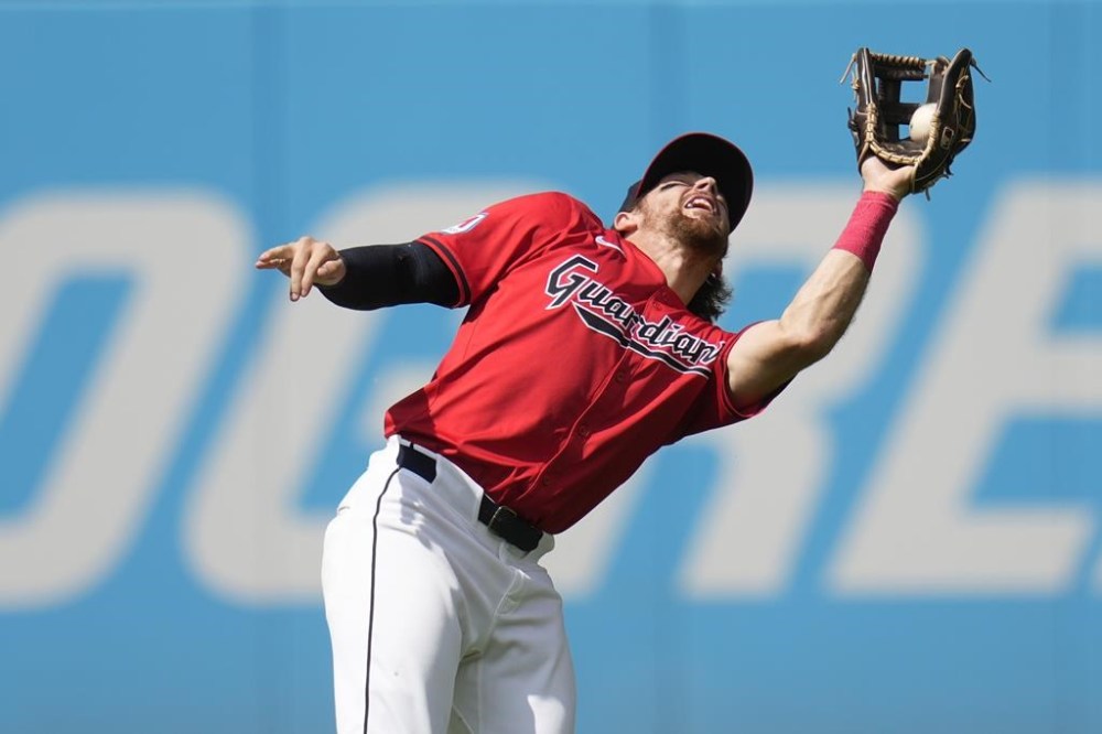 Cleveland Guardians shortstop Daniel Schneemann catches a pop up hit by Kansas City Royals' Kyle Isbel for an out in the fourth inning of a baseball game Wednesday, Aug. 28, 2024, in Cleveland. (AP Photo/Sue Ogrocki)