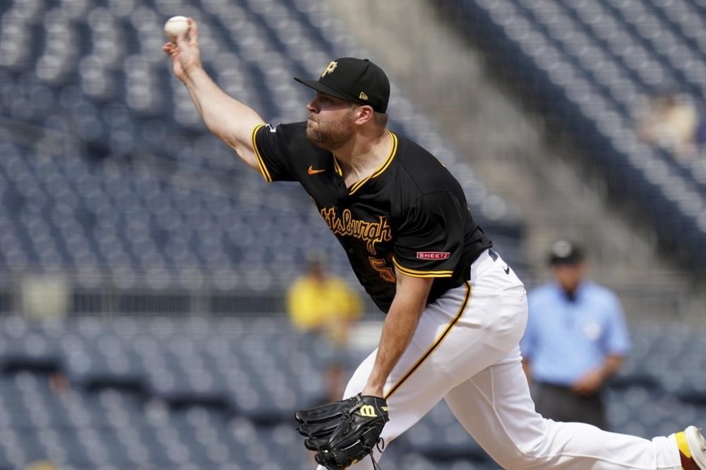 Pittsburgh Pirates relief pitcher David Bednar delivers during the ninth inning of a baseball game against the Chicago Cubs Wednesday, Aug. 28, 2024, in Pittsburgh. (AP Photo/Matt Freed)