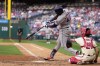 Houston Astros' Yordan Alvarez hits a home run off Philadelphia Phillies pitcher Michael Mercado during the eighth inning of a baseball game, Wednesday, Aug. 28, 2024, in Philadelphia. (AP Photo/Matt Slocum)