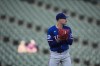 Texas Rangers starting pitcher Andrew Heaney looks behind him toward second base during the fifth inning of the first game of a baseball double header against the Chicago White Sox, Wednesday, Aug. 28, 2024, in Chicago. (AP Photo/Erin Hooley)