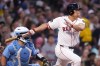 Boston Red Sox's Masataka Yoshida singles during the first inning of a baseball game against the Toronto Blue Jays at Fenway Park, Wednesday, Aug. 28, 2024, in Boston. (AP Photo/Charles Krupa)