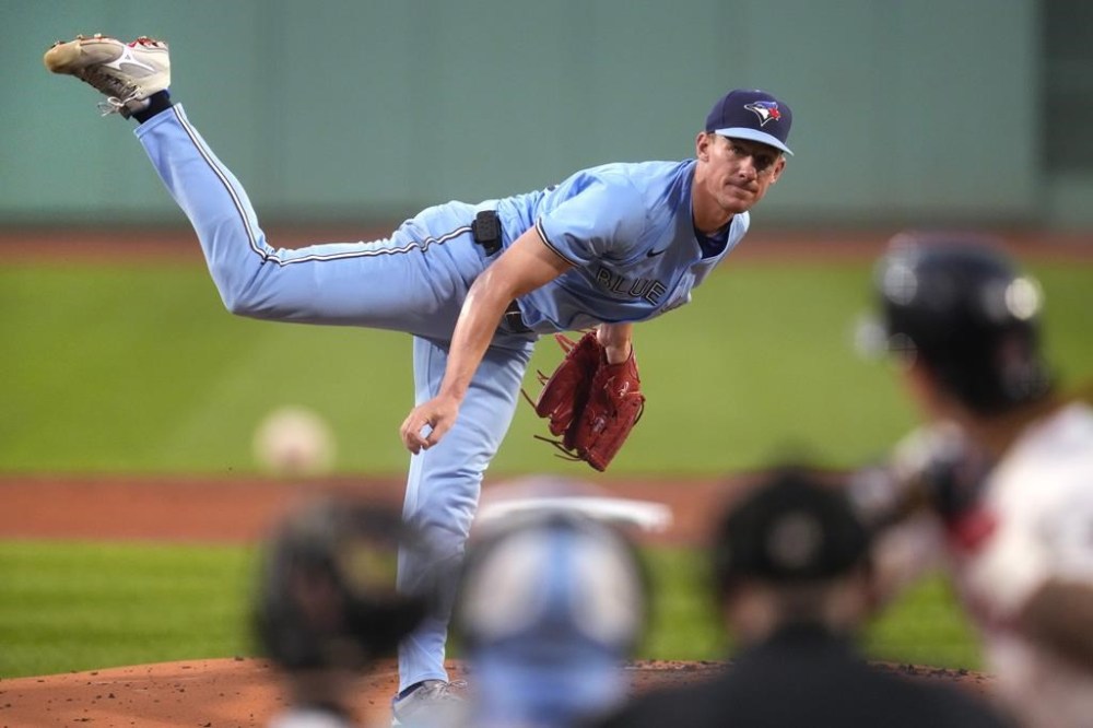 Toronto Blue Jays pitcher Chris Bassitt delivers during the first inning of a baseball game against the Boston Red Sox at Fenway Park, Wednesday, Aug. 28, 2024, in Boston. (AP Photo/Charles Krupa)