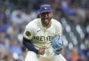Milwaukee Brewers starting pitcher Willy Peralta reacts after striking out a San Francisco Giants batter to end the sixth inning of a baseball game Wednesday, Aug. 28, 2024, in Milwaukee. (AP Photo/Jeffrey Phelps)