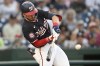 Washington Nationals' Dylan Crews hits his first major league home run during the first inning of a baseball game against the New York Yankees, Wednesday, Aug. 28, 2024, in Washington. (AP Photo/John McDonnell)