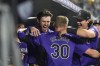 Colorado Rockies' Aaron Schunk, center, is congratulated by teammates Nolan Jones, left, and Michael Toglia after hitting his first home run of the major leagues, a solo shot off Miami Marlins starting pitcher Max Meyer, in the fifth inning of a baseball game Wednesday, Aug. 28, 2024, in Denver. (AP Photo/David Zalubowski)