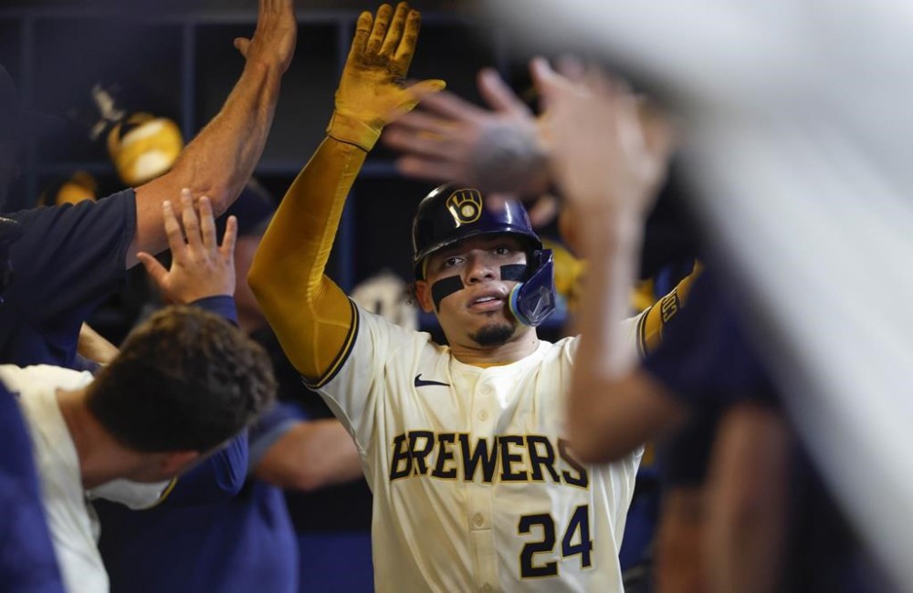 Milwaukee Brewers' William Contreras reacts after his two-run home run during the fifth inning of a baseball game against the San Francisco Giants, Wednesday, Aug. 28, 2024, in Milwaukee. (AP Photo/Jeffrey Phelps)
