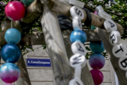 Swifties have fixed bracelets on a tree in the Cornelusgasse incity centre in Vienna on Friday, Aug.9, 2024. Organizers of three Taylor Swift concerts in the stadium in Vienna this week called them off on Wednesday after officials announced arrests over an apparent plot to launch an attack on an event in the Vienna area such as the concerts. (AP Photo/Heinz-Peter Bader)