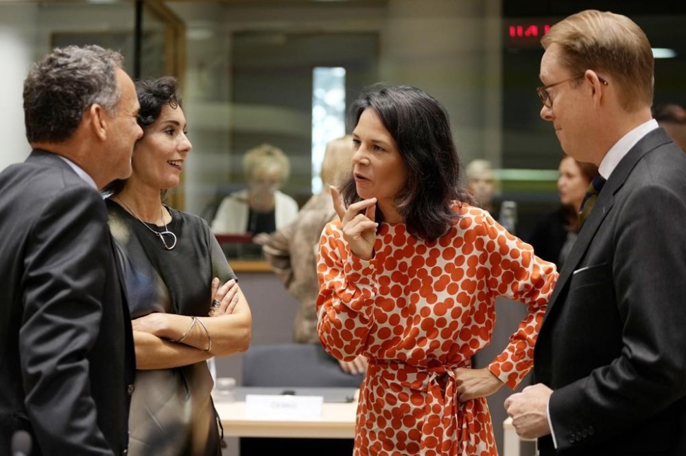 Germany's Foreign Minister Annalena Baerbock, center, speaks with from left, Netherlands' Foreign Minister Caspar Veldkamp, Belgium's Foreign Minister Hadja Lahbib and Sweden's Foreign Minister Tobias Billstrom during a meeting of EU foreign ministers at the European Council building in Brussels, Thursday, Aug. 29, 2024. (AP Photo/Virginia Mayo)