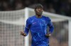 Chelsea's Noni Madueke celebrates after scoring his side's second goal during the Europa Conference League play-off first leg soccer match between Chelsea and Servette, at Stamford Bridge stadium in London, Thursday, Aug. 22, 2024. (AP Photo/Alastair Grant)