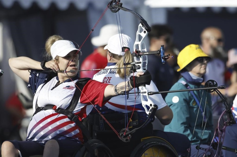 Archer Tracy Otto from the U.S. prepares to fire during the Paralympic Games in Paris on Thursday, Aug. 29, 2024. (AP Photo/Felix Scheyer)