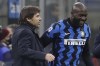 FILE - Inter Milan's head coach Antonio Conte congratulates his player Romelu Lukaku who scores the two goals during a Serie A soccer match between Inter Milan and Lazio at the San Siro stadium in Milan, Italy, Sunday, Feb. 14, 2021. (AP Photo/Luca Bruno, File)