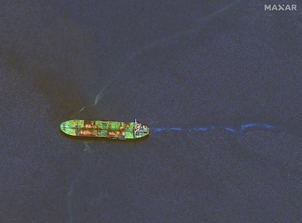 This image released by Maxar Technologies shows an overview of the Sounion oil tanker that was recently attacked by Houthi rebels on fire in the Red Sea, Thursday, Aug. 29, 2024. (Satellite image ©2024 Maxar Technologies via AP)