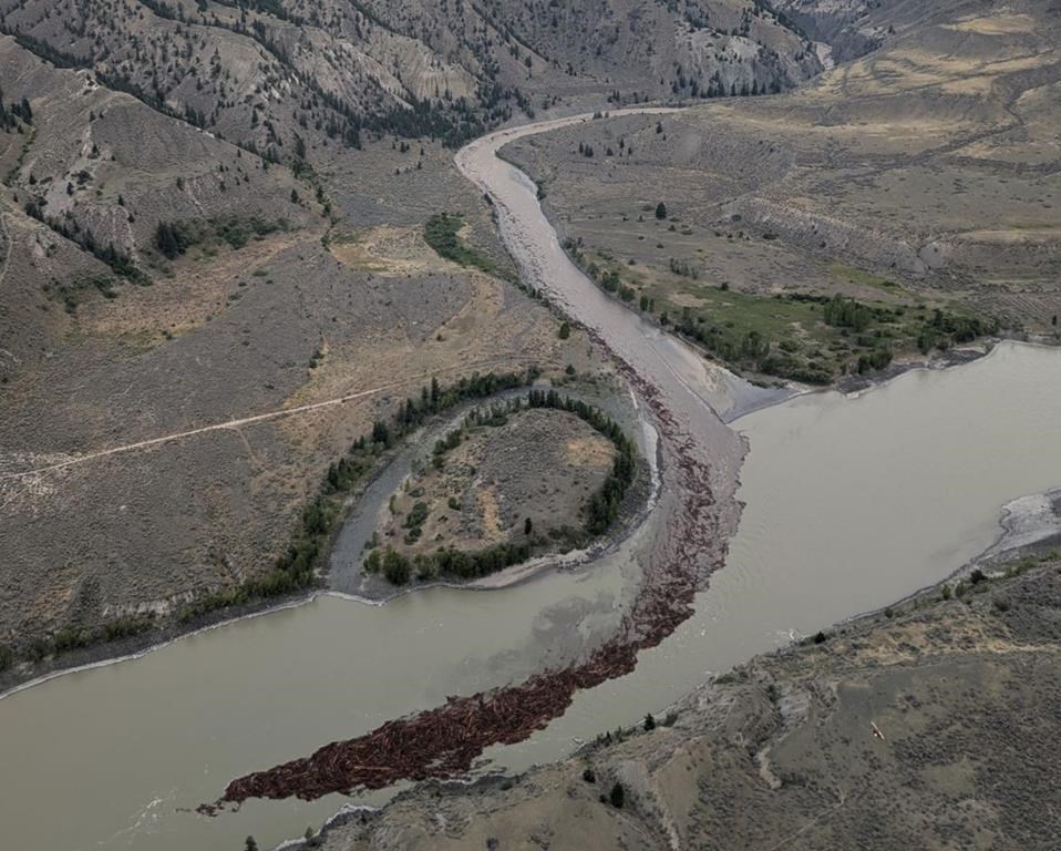 Debris is seen flowing down the Chilcotin River and into the Fraser River following a landslide near Williams Lake, B.C., in a Monday, Aug. 5, 2024, handout photo. THE CANADIAN PRESS/HO-Tsilhqot'in National Government, *MANDATORY CREDIT*