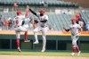 Los Angeles Angels shortstop Zach Neto (9) and right fielder Jo Adell high five each other after the ninth inning of a baseball game against the Detroit Tigers, Thursday, Aug. 29, 2024, in Detroit. (AP Photo/Carlos Osorio)