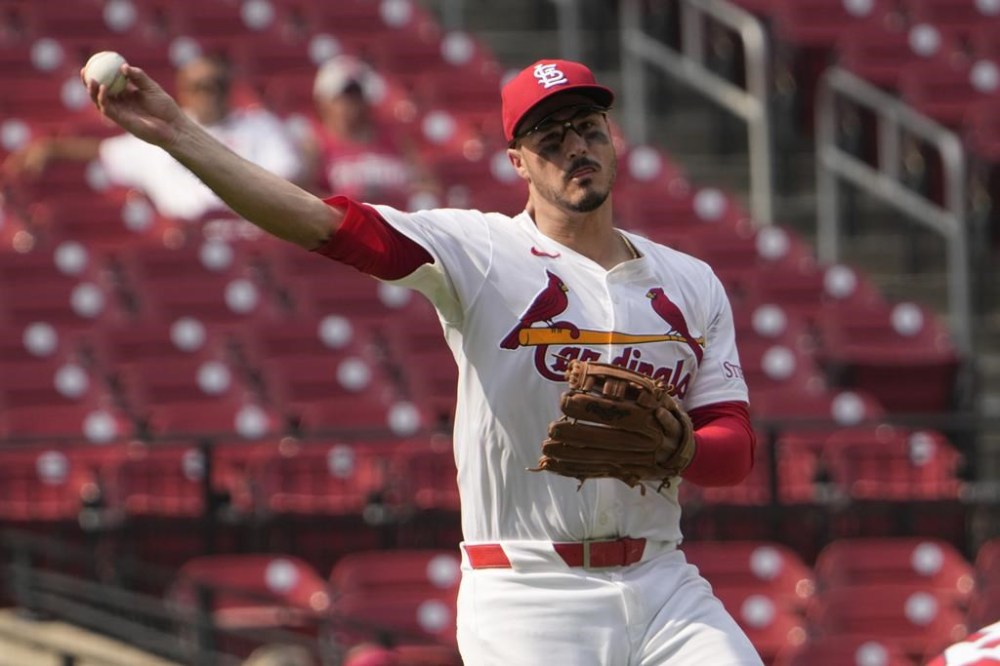 St. Louis Cardinals third baseman Nolan Arenado throws out San Diego Padres' Luis Arraez at first base during the eighth inning of a baseball game Thursday, Aug. 29, 2024, in St. Louis. (AP Photo/Jeff Roberson)