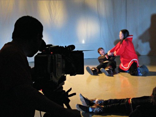 A camerman films Lamech Kadloo of Pond Inlet playing the role of Kiviuq in a scene where many of his fellow hunters are drowned while kayaking when a storm comes up. APTN is launching a channel with programming primarily in Indigenous languages next week. The TV network announced the channel in May as part of an application to consolidate its four programming feeds into two -- one main channel and 