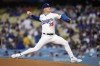 Los Angeles Dodgers starting pitcher Bobby Miller throws to the plate during the first inning of a baseball game against the Baltimore Orioles Thursday, Aug. 29, 2024, in Los Angeles. (AP Photo/Mark J. Terrill)