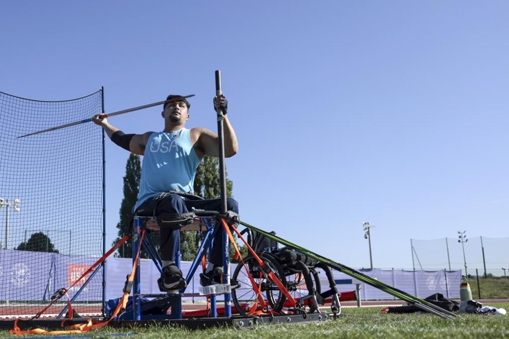 Justin Phongsavanh from the U.S. throws his javelin as he practices at the U.S. High Performance Center during the Paralympic Games in Paris on Wednesday, August 28, 2024. (AP Photo/Mady Mertens)