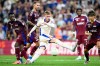 Chelsea's midfielder Cole Palmer, center, fights for the ball with, from left, Servette's defender Bradley Mazikou, Servette's defender Steve Rouiller and Servette's defender Keigo Tsunemoto during the Europa Conference League play-offs round second leg soccer match between Switzerland's Servette FC and England's Chelsea FC, at the Stade de Geneve stadium, in Geneva, Switzerland, Thursday, Aug. 29, 2024. (Laurent Gillieron/Keystone via AP)