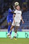 Leicester City's Caleb Okoli, left, and Tranmere Rover's Harvey Read Saunders battle for the ball during the English League Cup soccer match between Leicester City and Tranmere Rovers at the King Power Stadium, Leicester, England, Tuesday Aug 27, 2024. (Joe Giddens/PA via AP) /PA via AP)