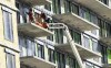 A construction worker is seen working on the site of a new condo development in Montreal on Feb. 19, 2024. THE CANADIAN PRESS/Christinne Muschi